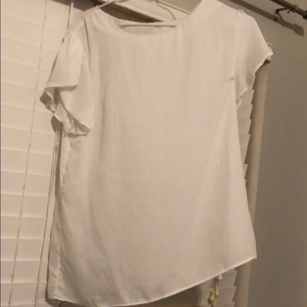 White ruffled sleeve blouse